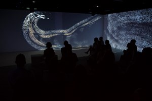 Wall and floor projections in the Learning Lab showcase.